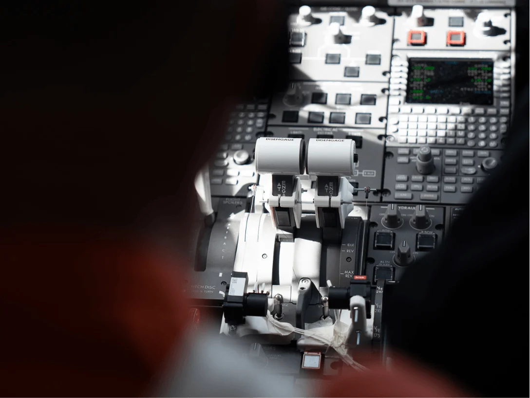 Aircraft flight test campaign with engineers monitoring cockpit instruments and performance data
