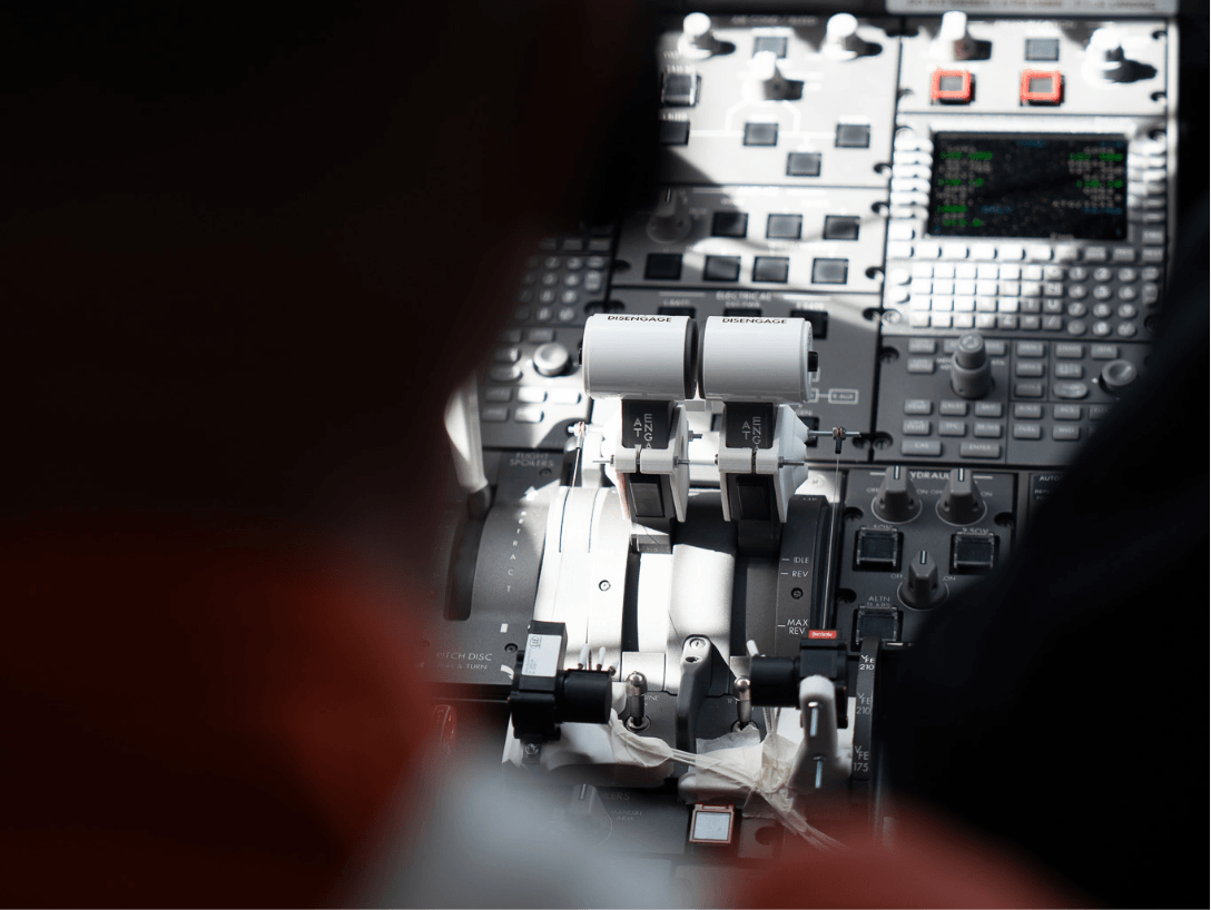 Aircraft flight test campaign with engineers monitoring cockpit instruments and performance data