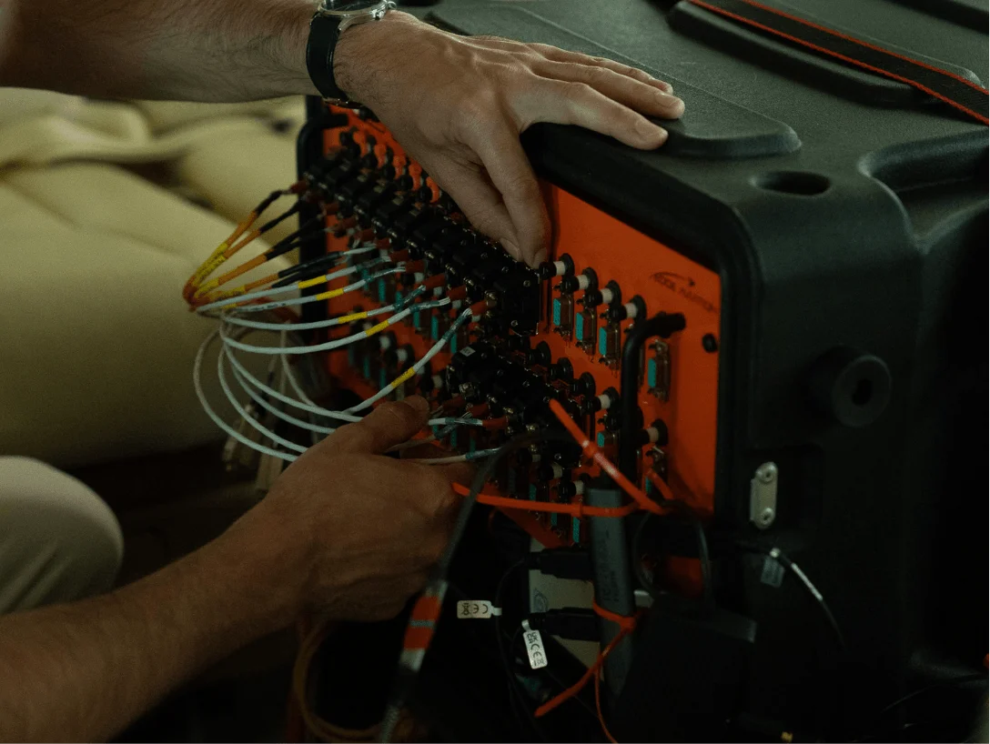 Flight data acquisition equipment collecting aircraft performance and sensor data during testing