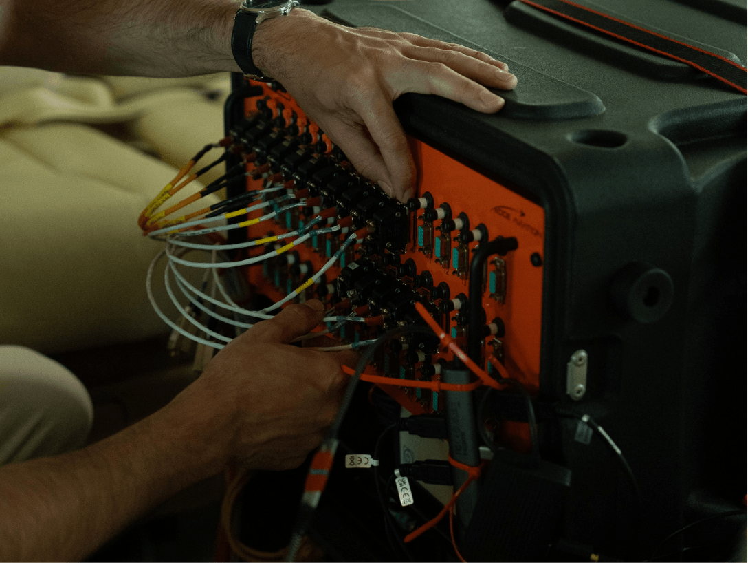 Flight data acquisition equipment collecting aircraft performance and sensor data during testing